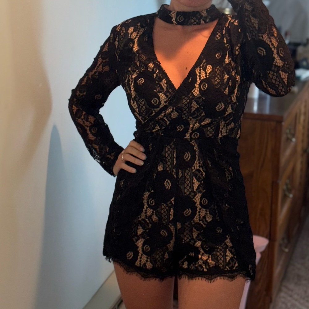 Francesca’s black lace romper